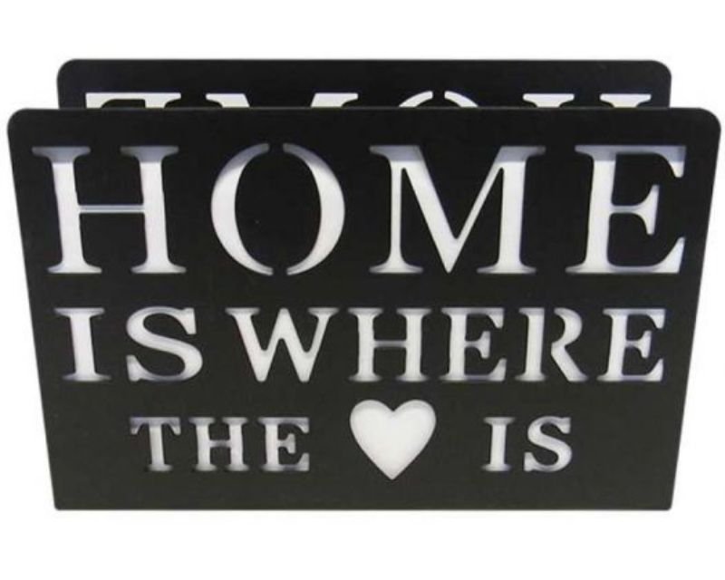 Elegant black metal napkin holder with "Home is where the heart is" cut-out, measuring 15 cm x 10 cm, ideal for stylish organization.