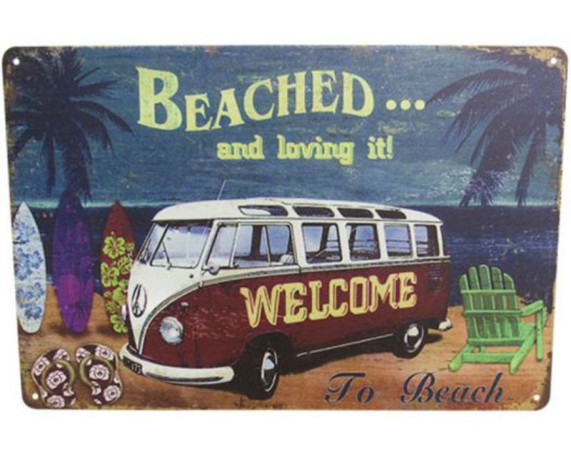 Retro coastal-themed tin sign featuring vibrant colors, perfect for enhancing home decor with a fun beach vibe.