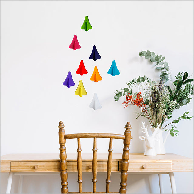 Colorful jet plane wall art set of 9, crafted from moisture-resistant acrylic, perfect for children's rooms and playful decor.