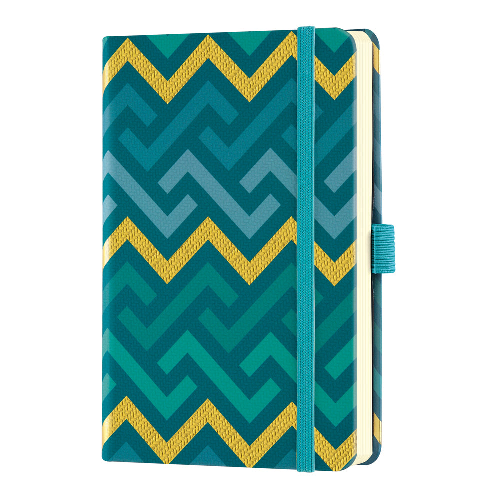 Elegant Castelli Oro Pocket Ruled Labyrinths notebook with textured cover, gold ribbon marker, and organized ruled pages.
