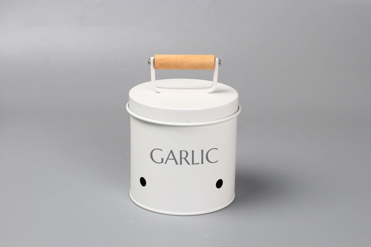 Stylish Rockingham garlic storage bin with metal lid, wooden handle, and ventilation holes for freshness, compact and durable.
