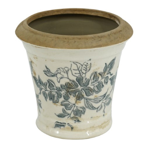 Vintage vase with intricate floral patterns and aged finish, perfect for home decor and displaying fresh bouquets.
