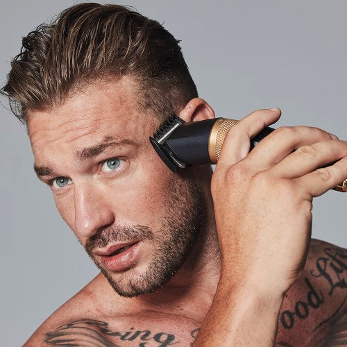 Xpert Hair Clipper by Conairman with Japanese steel blades, 10 comb guides, cordless use, and essential grooming accessories.