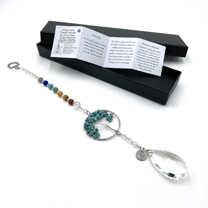 Suncatcher featuring Tree of Life design and Howlite, promoting throat chakra healing and vibrant light reflections.