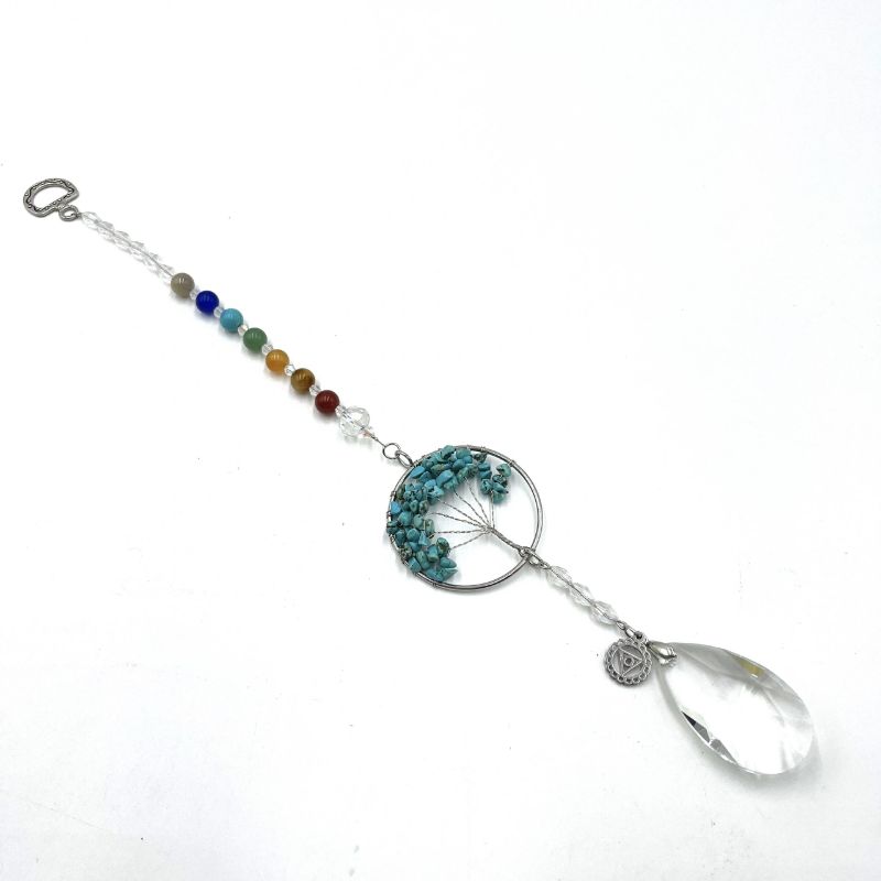 Suncatcher featuring Tree of Life design with howlite, enhances throat chakra and promotes clarity, measuring 32.5cm.
