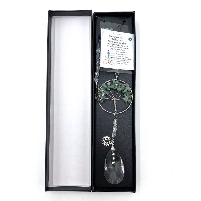 Aventurine suncatcher featuring a Tree of Life design, promoting positive energy and chakra healing in home decor.