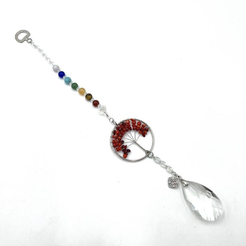 Stunning red coral Suncatcher featuring a Tree of Life design, promoting grounding and harmony in your space.