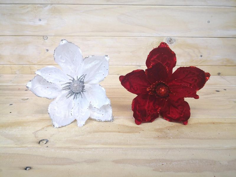 Red velvet artificial magnolia head, elegantly crafted for vibrant decor, perfect for any home or event centerpiece.