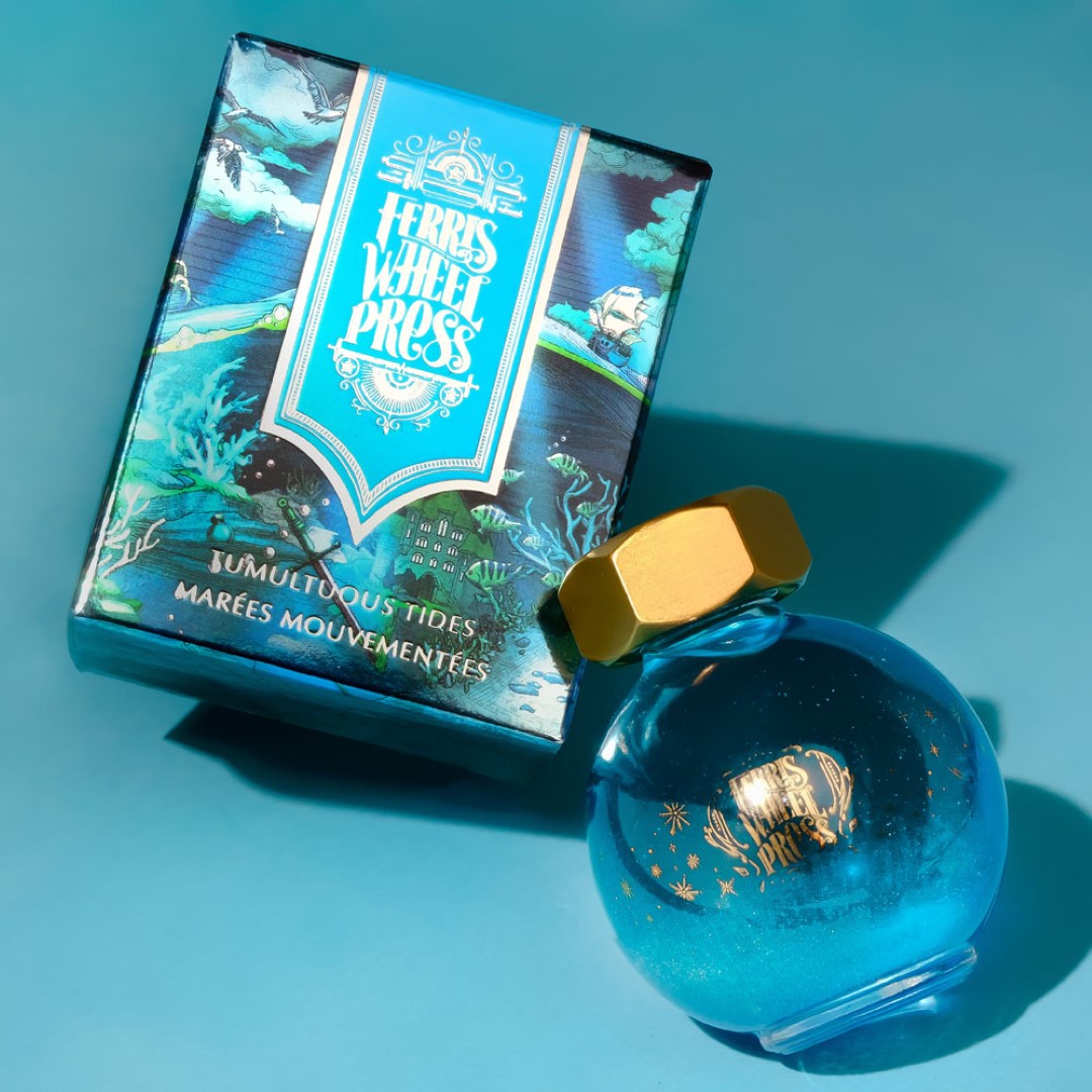 Luxurious ocean teal fountain pen ink with silver shimmer, perfect for inspiring creative writing and art.