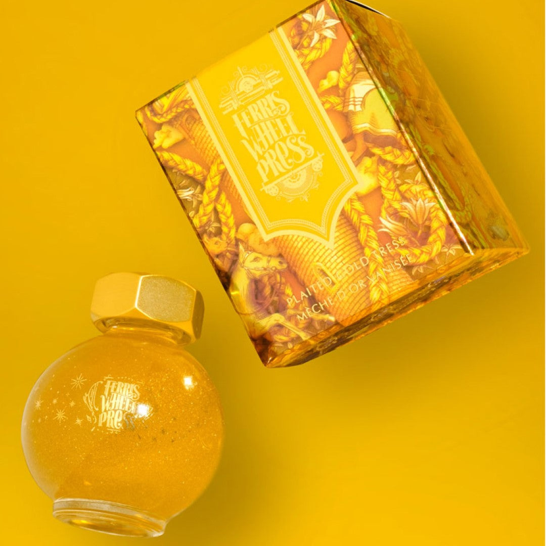 20ml bottle of Ferris Wheel Press Fountain Pen Ink in radiant gold, ideal for elegant writing and artistic projects.