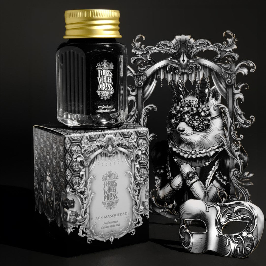 Elegant black calligraphy ink with silver shimmer, perfect for weddings and artistic projects, inspired by a masquerade ball.