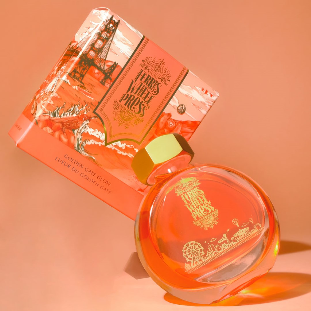 Vibrant orange-red fountain pen ink inspired by the Golden Gate Bridge, perfect for creative writing and artistry.