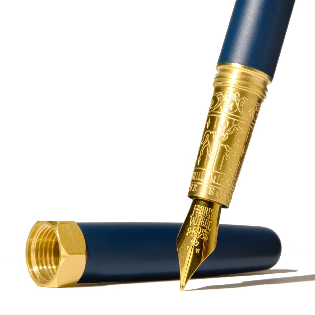 Luxurious Crystal Blue fountain pen with 14k gold nib, engraved brass grip, perfect for elegant writing and calligraphy.