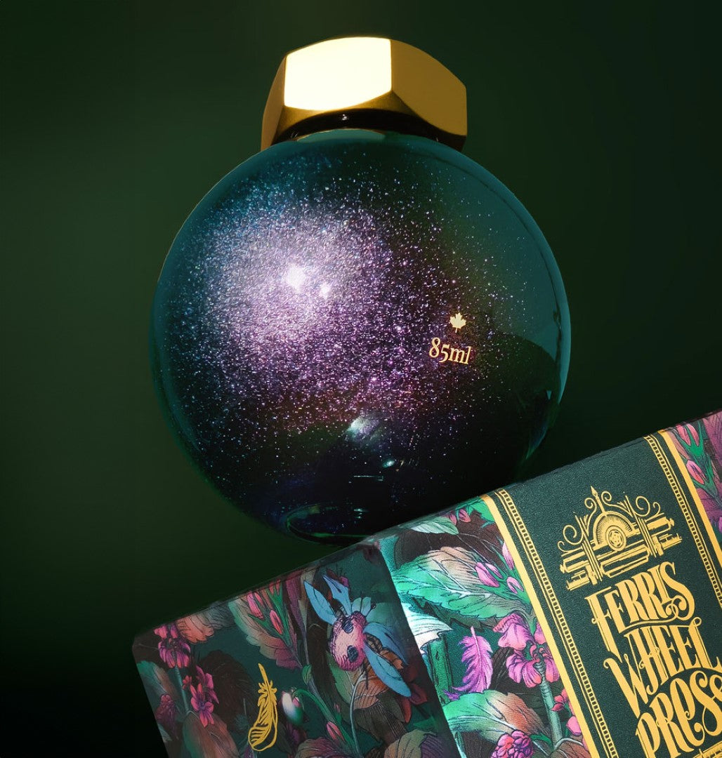 Dark teal fountain pen ink with gold and pink shimmer, inspired by whimsical tales and perfect for creative writing.