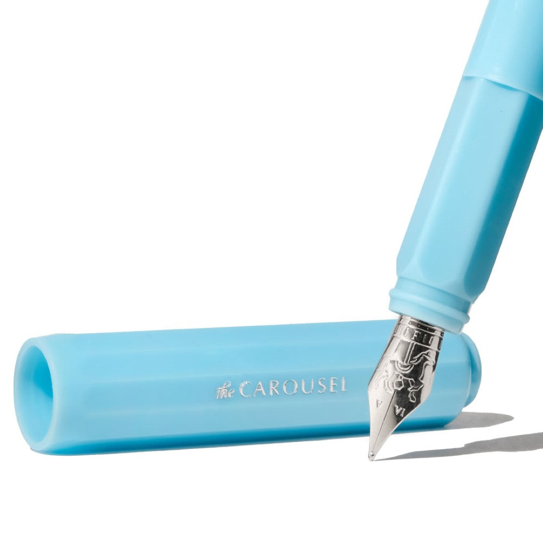 Ferris Wheel Press Carousel Fountain Pen featuring a galloping horse design, fine custom-ground steel nib, and ink converter.