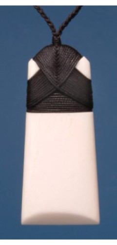 Medium Plain Toki Pendant in bone, showcasing unique Maori craftsmanship, symbolizing strength with adjustable black wax cord.