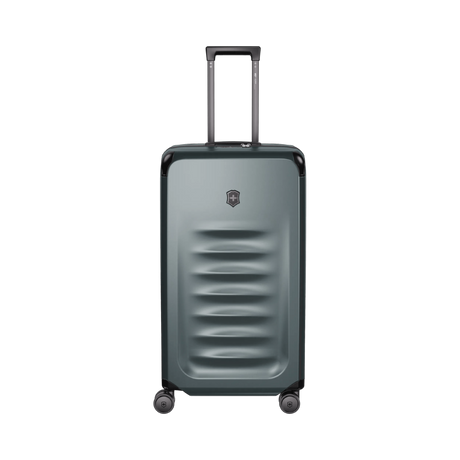 Storm-colored VICTORINOX Spectra 3.0 Large Hardside Trunk featuring durable SORPLAS™, 99L capacity, and smooth 8-wheel mobility.