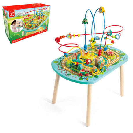 Twisting Railway Maze Table - Hape: Colorful maze table with trains, beads, and amusement park theme for fine motor skill development.