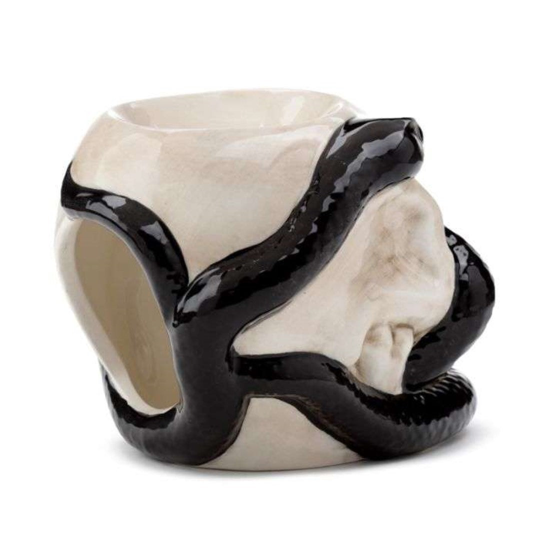 Ceramic oil burner shaped like a skull with a coiled snake, ideal for aromatherapy and unique home decor.