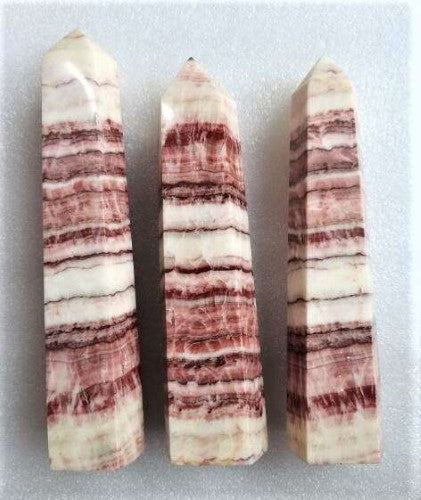 Crystal Point - Rhodonite (500-599g)