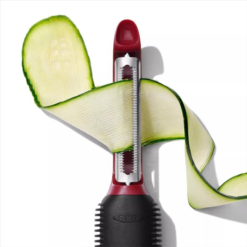 Three-piece OXO Good Grips Peeler Set featuring durable Japanese stainless steel blades and ergonomic handles for effortless peeling.