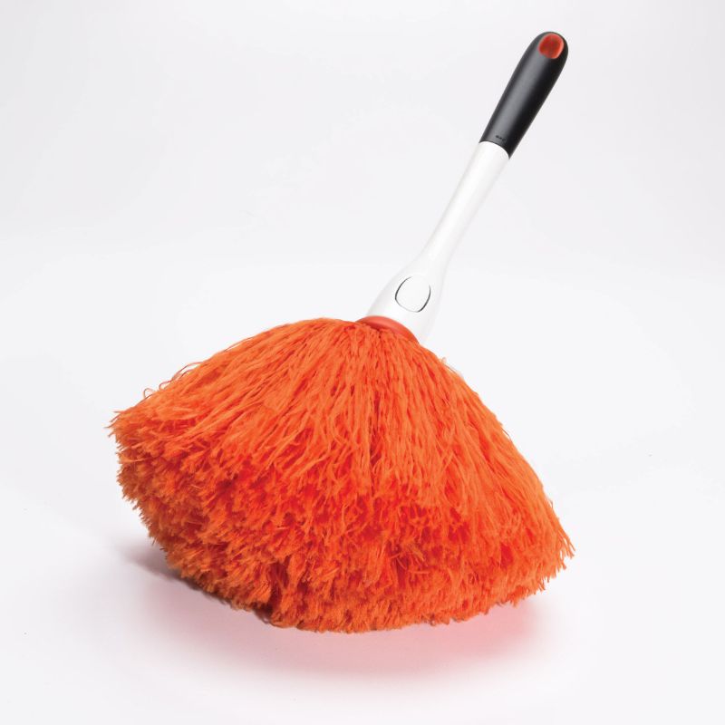Ultra-soft microfiber duster designed for safe dusting of delicate items like picture frames and knick-knacks.