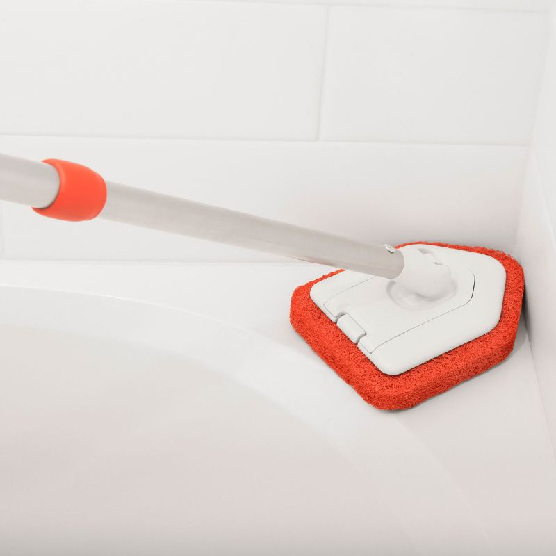 OXO Extendable Tub & Tile Scrubber with anti-microbial head, extending 26"-42" for easy cleaning of hard-to-reach areas.