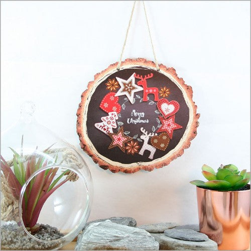 Holiday wall art featuring red and black wood slices, ready to hang, perfect for festive home decor.