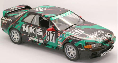 1/12 scale model kit of HKS Skyline GT-R by Fujimi, featuring intricate parts, decals, and authentic detailing for car enthusiasts.