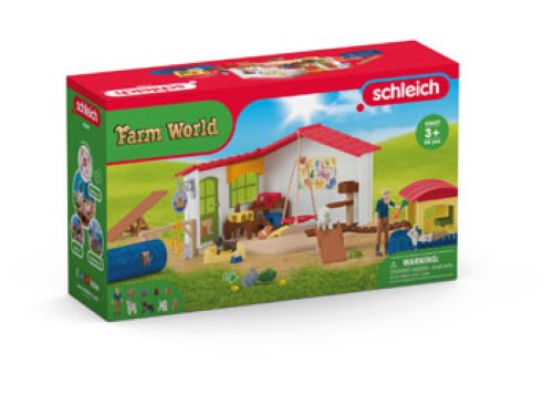Colorful Schleich Pet Hotel playset with cozy suites and reception area, perfect for imaginative pet care role-playing.