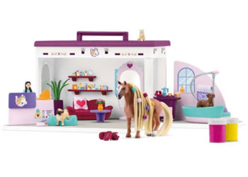 Colorful Schleich Pet Salon playset featuring detailed puppy and kitten figures for creative grooming and imaginative play.