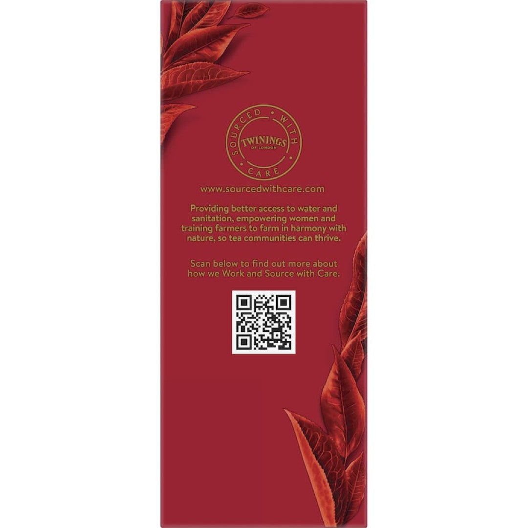 Twinings Loose Leaf English Breakfast Tea in a rustic setting with black tea leaves, highlighting its rich and robust flavor.