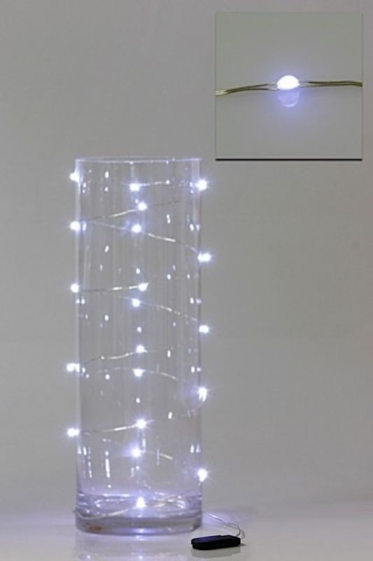 Pure white LED seed lights on copper wire, perfect for decorating floral arrangements and creating enchanting atmospheres.