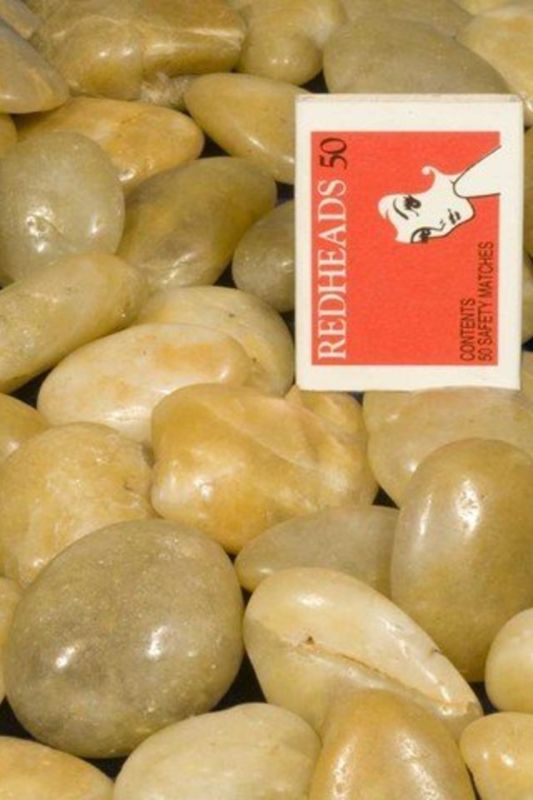 Set of 18 polished yellow river pebbles, each 2x3 cm, perfect for garden decor and DIY projects.