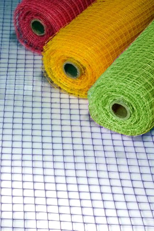 Vibrant lime decorative veiling roll, 60cm wide and 9.14m long, perfect for crafting, events, and floral arrangements.