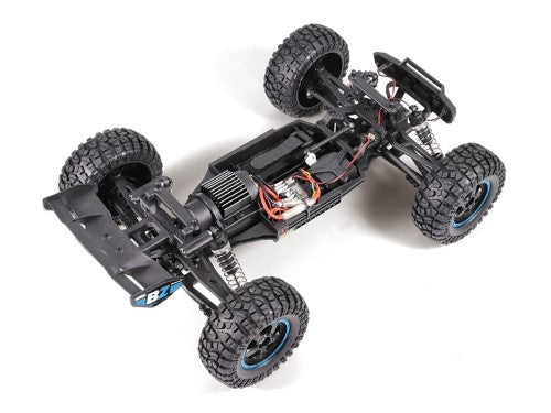 Alt text: Electric blue 1/12 scale RC monster truck featuring 4WD, robust suspension, and splashproof electronics for all-terrain fun.