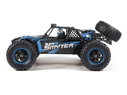 Remote control blue desert buggy with 4WD, powerful motor, splashproof design, adjustable shocks, and LED lights.