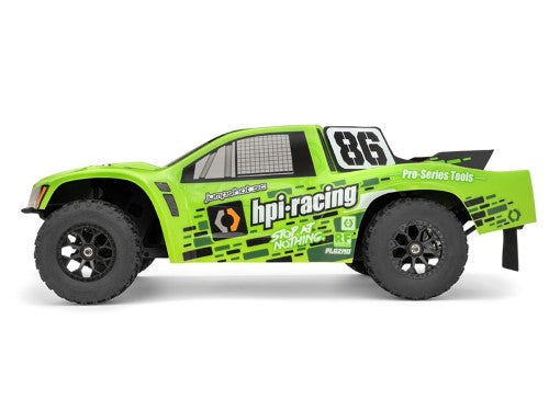 HPI Racing 1/10 Jumpshot SC V2 electric short course truck with metal gears, oil-filled shocks, and rugged design for thrilling racing.