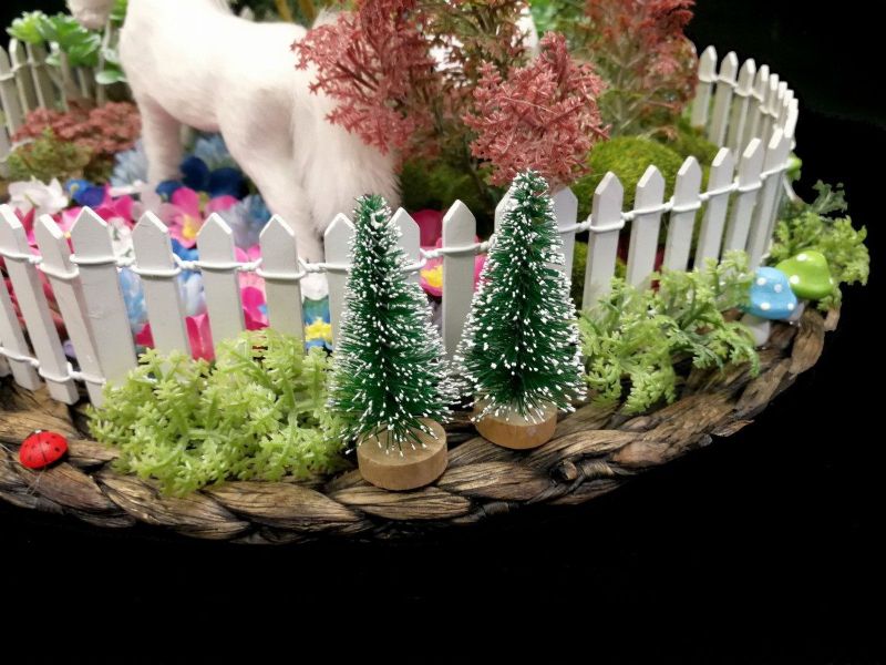 Mini Christmas tree, 5.5cm tall, perfect for holiday decorations or as a festive tabletop accent.