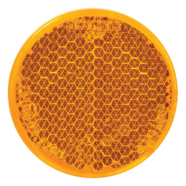 Retro amber reflector with self-adhesive backing, 42mm diameter, packaged in a blister for easy installation.