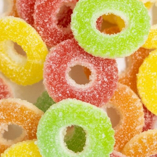 Vibrant 2kg bag of Kiwi Delights gummy sour colorful rings, offering a tangy and sweet fruity experience.