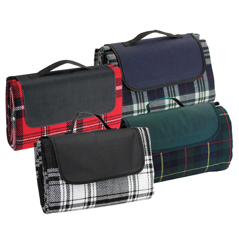 Spacious green picnic rug with waterproof backing, velcro closure, and carry handle for outdoor adventures.
