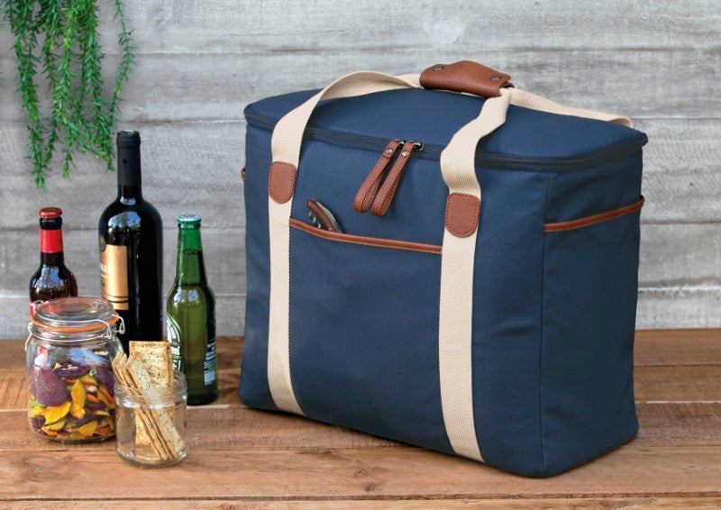 Sleek black Hamptons Cooler made of luxury waxed cotton, featuring insulated compartments and durable faux leather trim.