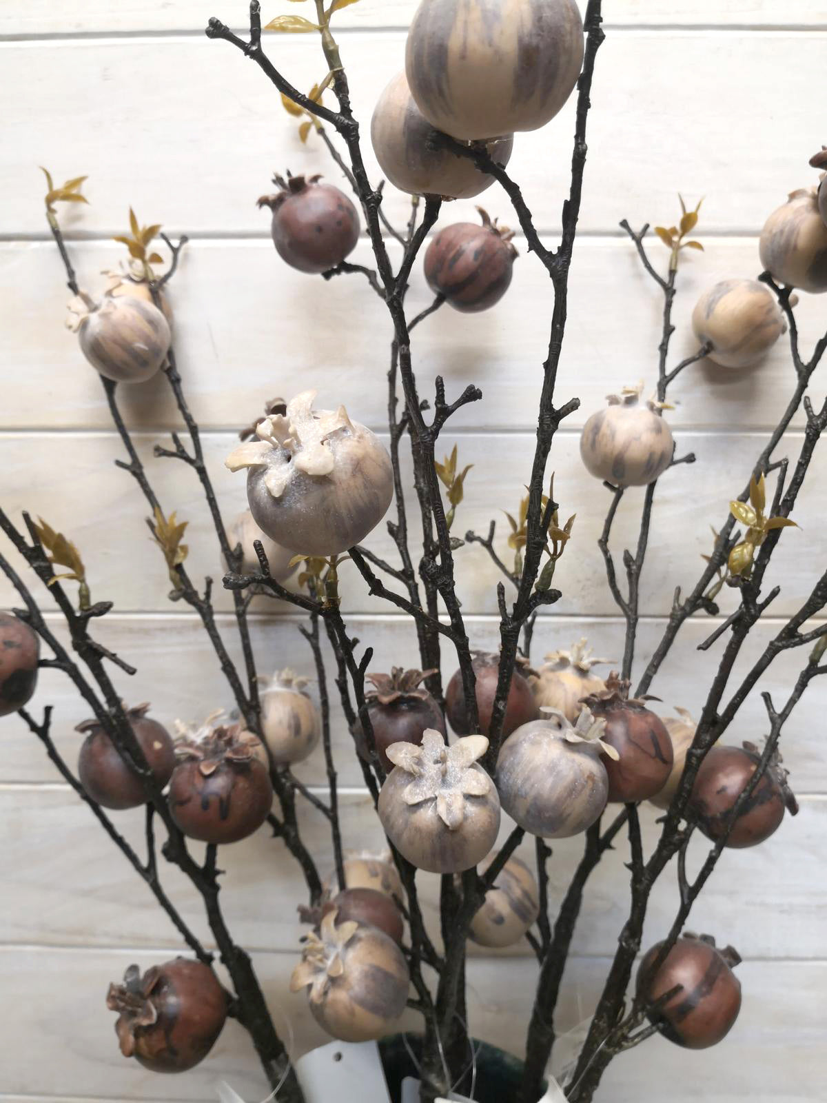 Vibrant artificial large rosehip spray, perfect for year-round decor and adding a natural touch without maintenance.