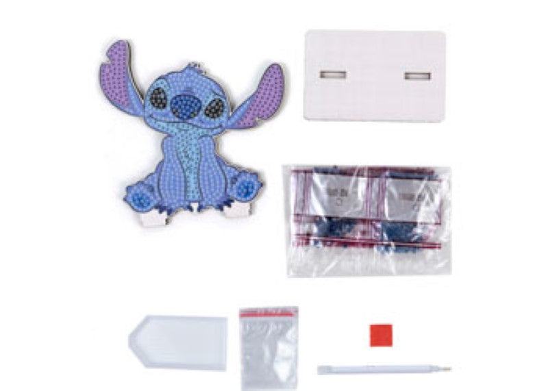 Sparking creativity, CrystalArt Buddy - Stitch features a colorful wooden figurine kit for ages 6+, perfect for family fun.