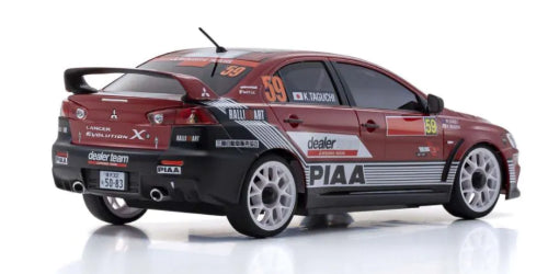 Kyosho MA-020 Lancer Evo X model car with AWD, designed for drifting, featuring VCS suspension and 2.4GHz transmitter.
