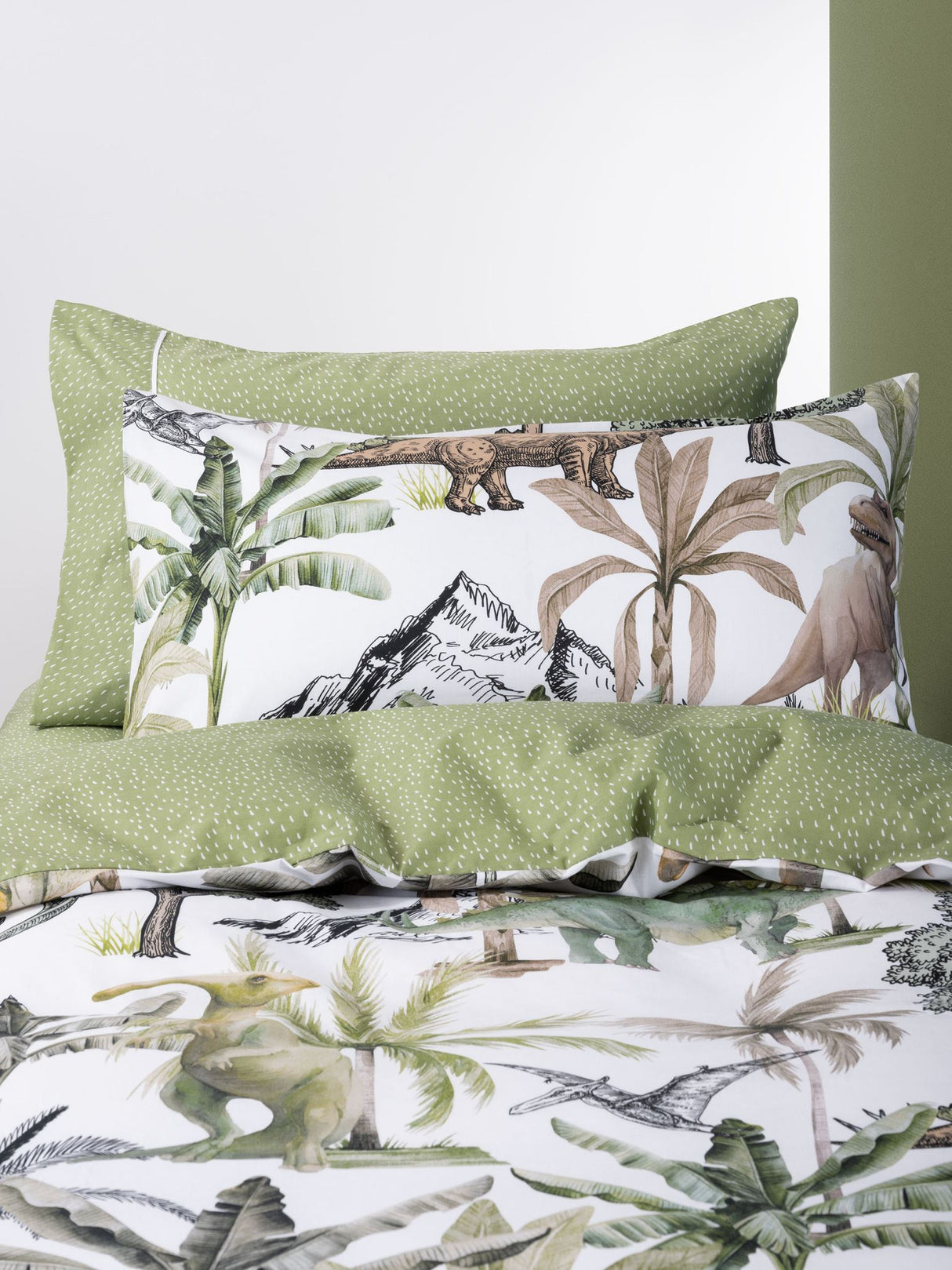 Colorful dinosaur-themed single duvet cover set featuring 100% cotton, reversible design, and perfect for kids' bedrooms.