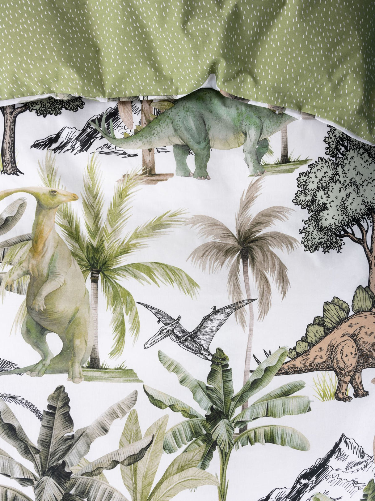 Single duvet cover set featuring vibrant dinosaur designs on 100% cotton, reversible with a hand-drawn fleck pattern.
