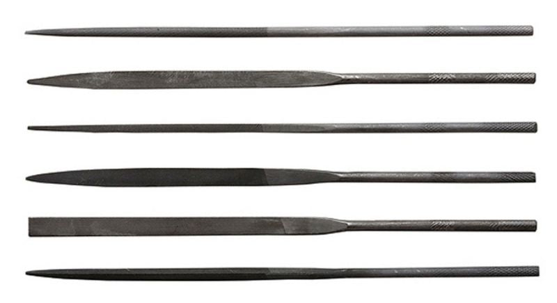 Set of 6 needle files in various shapes, crafted from durable steel for DIY and craft precision projects.