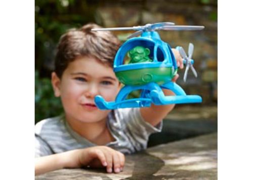 Bright blue eco-friendly helicopter toy made from recycled plastics, featuring spinning rotors and a pilot bear figure.